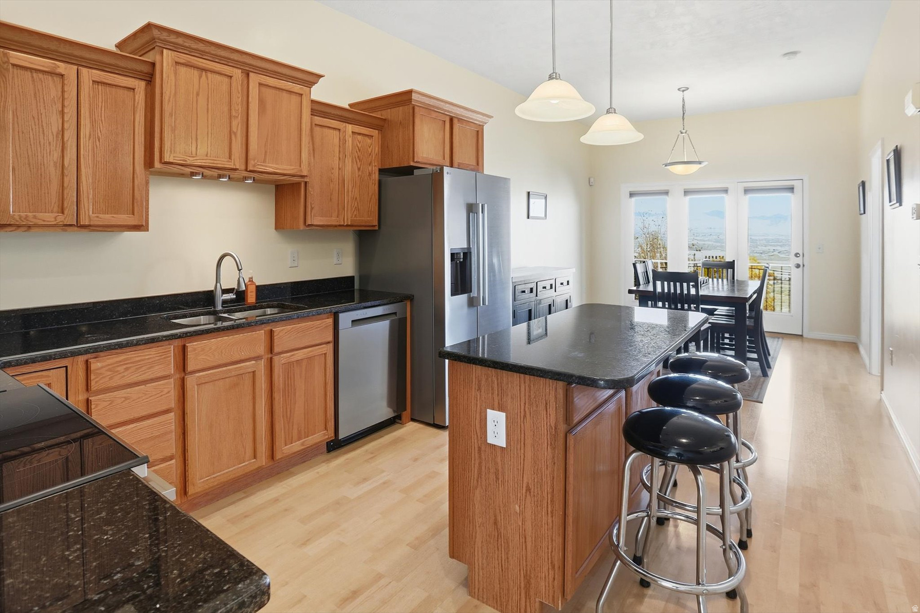 Kitchen with island and pendant lighting